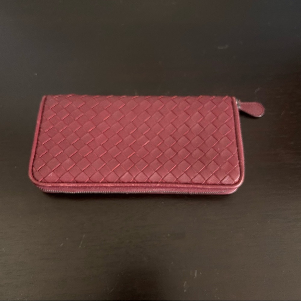 Bottega Veneta Intrecciato leather zip-around long wallet in rich burgundy